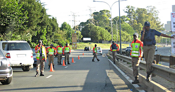 Johannesburg Metro Police Department Officers conducting a roadblock on a busy highway