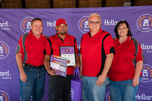 Pieter Friederick and his team, posing with his award